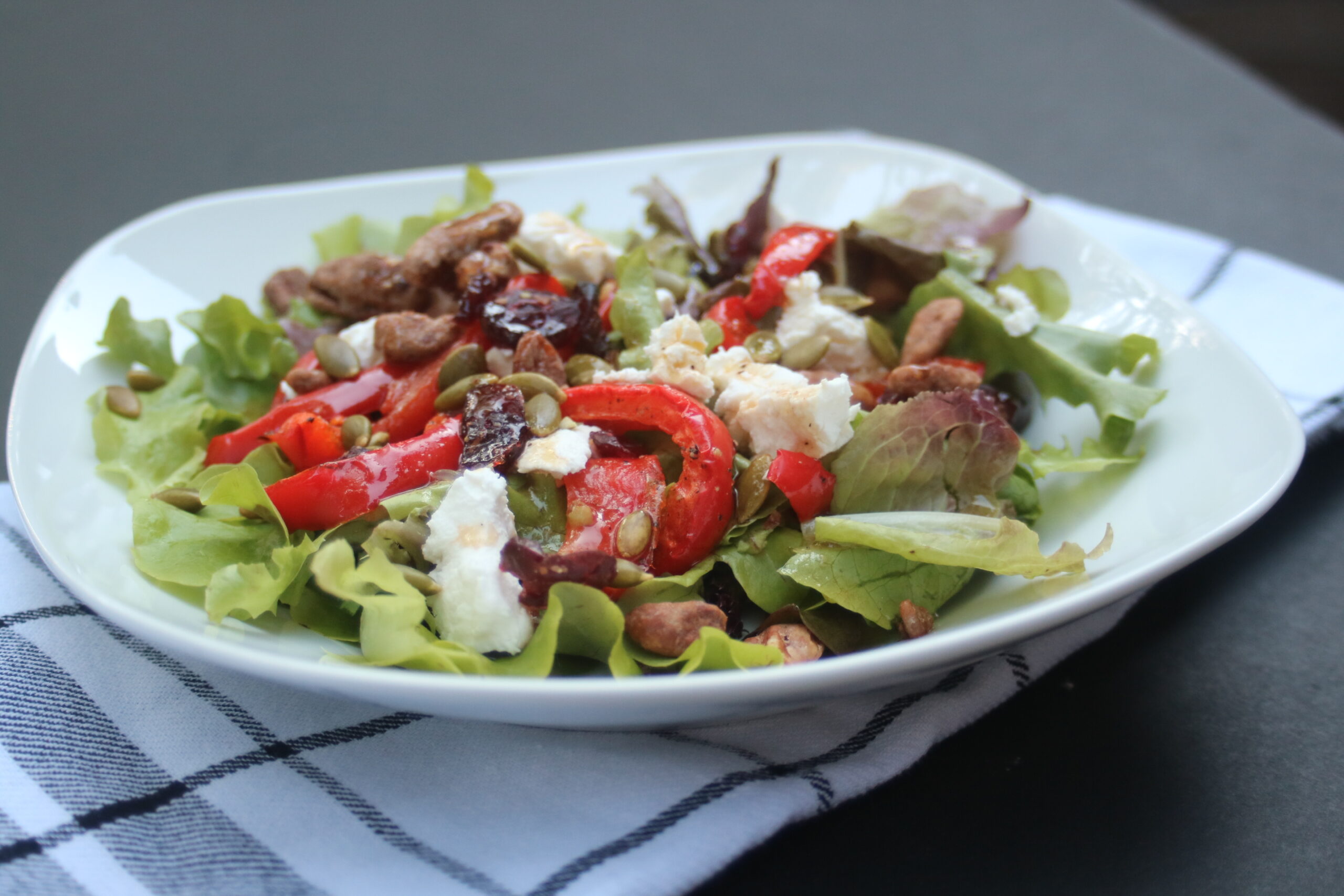 Spring Mix Salad with Roasted Red Peppers + Goat Cheese + Nuts potsandplanes.com